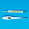 Digital and mercury thermometers on blue background for medical concept.